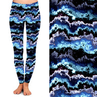 Leggings with a blue and black abstract pattern on a white background