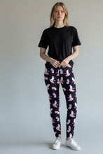 Load image into Gallery viewer, Woman wearing Space Unicorn leggings with outer pockets
